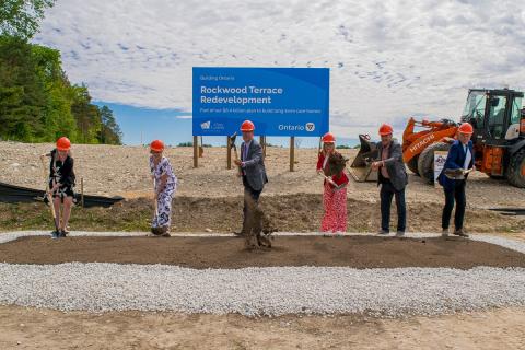Jennifer Cornell, Karen Kraus, Brian Milne, Natalia Kusendova-Bashta, Kevin Eccles, Rick Byers throw soil at the construction kickoff event for Rockwood Terrace.